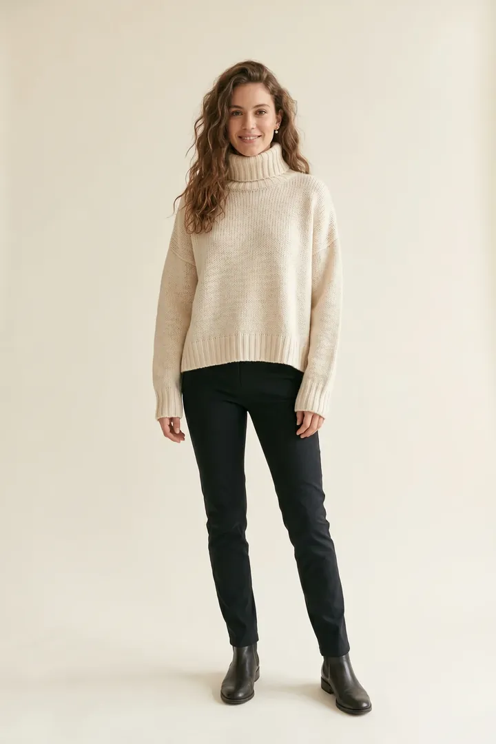 Oversized ivory turtleneck sweater
